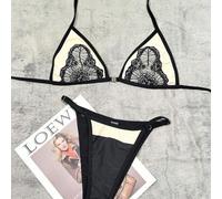 Damen sexy zweiteiligerBikini in Schwarz und Weiß mit Farbblöcken, Spitze-Dreiecken und Neckholder-Design, leichter Luxus Bademode für Resort und Stra