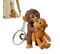 FROVOL Protect Punch The Monkey Schlüsselanhänger, niedlicher 3D-Affe, der Plüschtier hält, Schlüsselanhänger zum Aufhängen, für Rucksack, Autoschlüssel, Geschenk, Stil B, One size