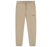 HUGO Jogginghose aus Baumwoll-Terry mit Split-Logo - Style Dusplitan, 50542866 Beige XXL