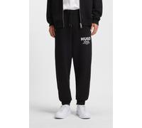 Jogginghose HUGO "Nevez", Herren, Gr. XXL, N-Gr, schwarz (schwarz005), Sweatware, Obermaterial: 100% Baumwolle, unifarben, oversize lang, Hosen Jogginghose, mit Beinbündchen und Oversize-Passform (961