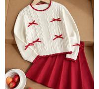 Kleine Mädchen Lässig und doch modisch und süß rotes Pullover-Set, beinhaltet eine Strickjacke mit Schleife und einen plissierten Strickrock, weich un