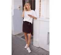 Kniefreier Rock aus Cord mit Schlitzdetail