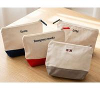 Kulturbeutel aus Baumwolle mit Stickerei - eigener Text