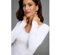 Langarmshirt AJC "mit Spitzenborte am Ausschnitt", Damen, Gr. 40/42, weiß, Rippware, Obermaterial: 100% Baumwolle. Spitze: 95% Polyester, 5% Elasthan, unifarben, Basic, sehr figurbetont, V-Ausschnitt,