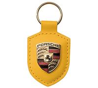 Porsche Schlüsselanhänger aus gelbem Leder mit silbernem Metallwappen, offizielles Lizenzprodukt