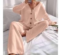 Strickjacke mit überschnittener Schulterpartie und Strickhose mit Schnürung vorne