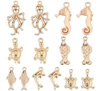 SUNNYCLUE 1 Box 70 Stück 7 Stile Meerestier Anhänger Goldene Strand Anhänger Großpackung Mit Legierung Goldenes Seepferdchen Delfin Schildkröte Fisch Krake Metall Meerestiere Anhänger Zur Schmuckherst