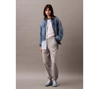 Sweathose CALVIN KLEIN JEANS "MONOLOGO FRENCH TERRY JOGGER", Damen, Gr. L (42), N-Gr, grau (heroic grau heather), Jersey, Obermaterial: 86% Baumwolle, 14% Polyester, meliert, bequem lang, Hosen Sweath