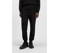 Sweathose HUGO "Dimacs Metal Logo", Herren, Gr. L, N-Gr, schwarz (schwarz002), Sweatware, Obermaterial: 82% Baumwolle, 13% Polyester, 5% Elasthan, unifarben, relaxed fit lang, Hosen Sweathose, elastis