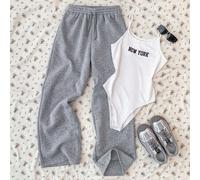 Teenager Mädchen gestrickter weißer Träger-Jumpsuit und graue weite Hose Lässig Set
